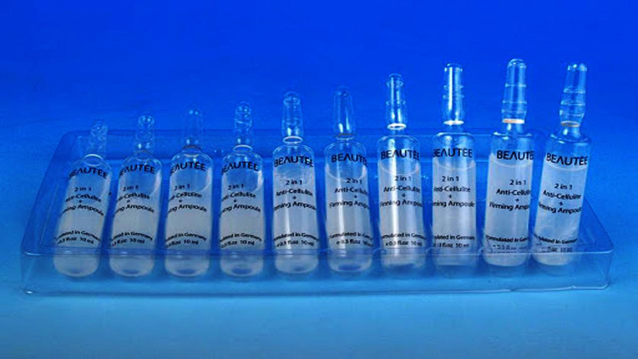 liquid solution bottles labeling machine samples final products ampulky lahvičky.jpg