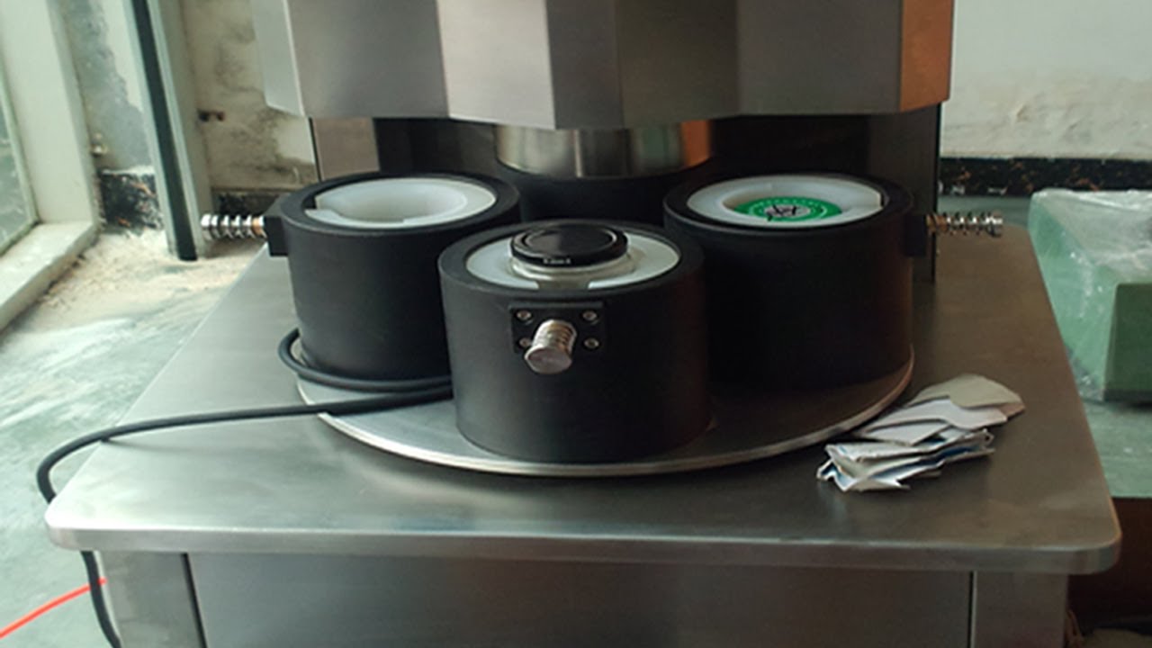 four heads vacuum capping machine semi automatic vakuový uzávěr manual.jpg