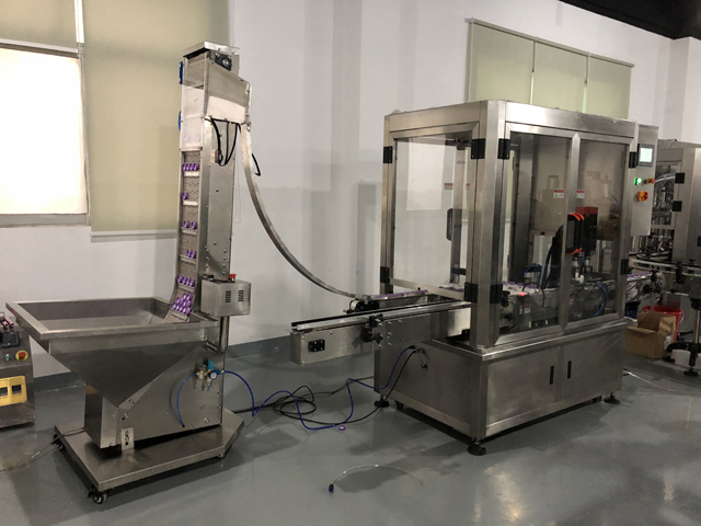 zavíčkovací stroj kosmetické stroje.JPG